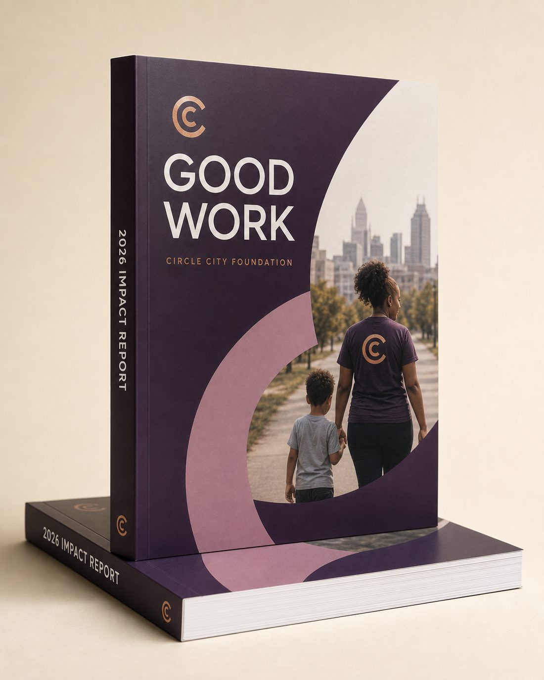 Perfect-bound annual impact report showing the printed spine